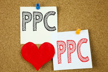 Kavramsal el PPC - Pay per Click kavramı Internet Seo para ve yapışkan not, hatırlatma mantar arka plan kopya alanı ile yazılı aşk için gösterilen metin resim yazısı ilham yazma