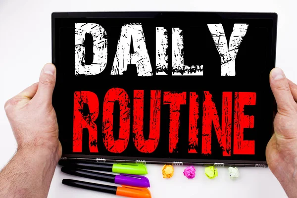 Daily Routine text written on tablet, computer in the office with marker, pen, stationery. Business concept for Accuracy Procedure white background with copy space