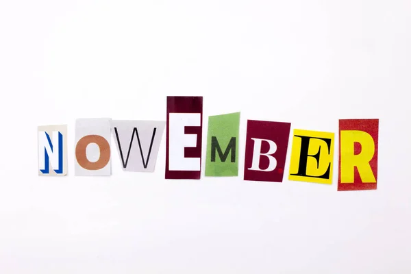 A word writing text showing concept of NOVEMBER made of different magazine newspaper letter for Business case on the white background with copy space — Stock Photo, Image