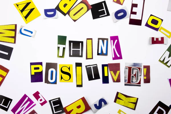 Слово написання тексту, що показує концепцію Think Positive, зроблену з різних журнальних газетних листів для ділової справи на білому тлі з копіювальним простором — стокове фото