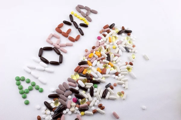 Metin resim yazısı ilham tıbbi bakım sağlık kavramı kopya alanı beyaz izole zemin üzerine hap ilaç kapsül word anoreksiya ile yazılı yazma el