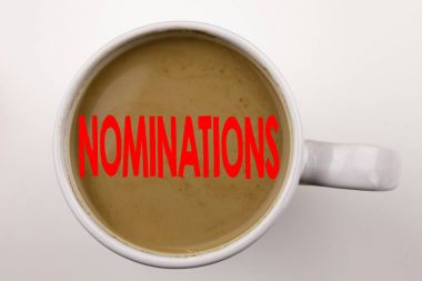 Word, writing Nominations text in coffee in cup. Business concept for Election Nominate Nomination on white background with copy space. Black text with red word. clipart
