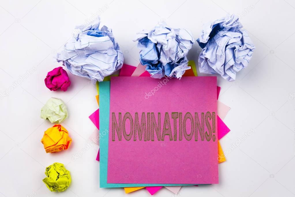 Writing text showing Nominations written on sticky note in office with screw paper balls. Business concept for Election Nominate Nomination on the white isolated background.