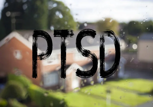 Announcement text caption showing PTSD Post-Traumatic Stress Disorder . Business concept for Health Treatment written on old brick background with copy space
