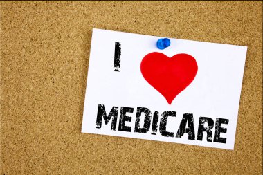 Metin resim yazısı ilham gösterilen kapsamlı tıbbi sigorta sağlık planı üzerinde yapışkan not, hatırlatma izole arka plan kopya alanı ile yazılı sevgi dolu anlamı aşk Medicare kavramı yazma el