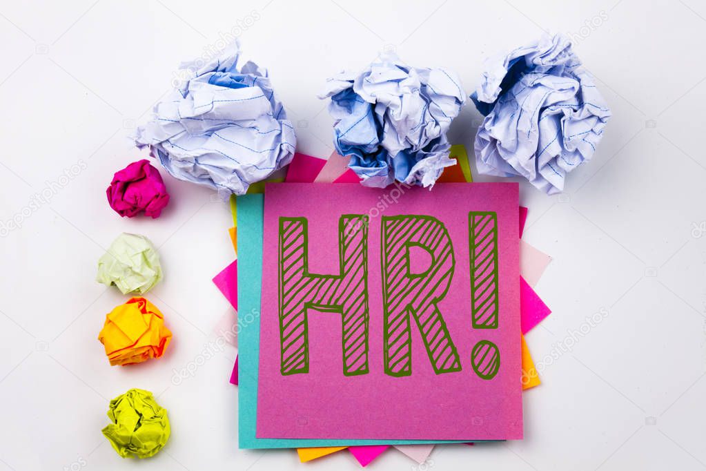 Writing text showing HR Human resource written on sticky note in office with screw paper balls. Business concept for Personnel Staff Forces on the white isolated background.