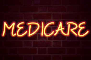 Medicare neon tabela tuğla üzerinde arka plan duvar. Floresan Neon tüp işareti tuğla iş kavramı kapsamlı tıbbi sigorta sağlık sigortası için 3d render