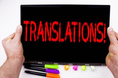 Translations text written on tablet, computer in the office with marker, pen, stationery. Business concept for  Translate Explain Plead Book Language white background with copy space clipart