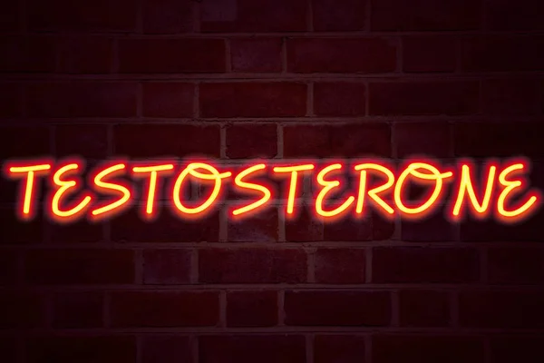 Testosterone neon sign on brick wall background. Fluorescent Neon tube Sign on brickwork Business concept for Hormone Molecule Male Steroid 3D rendered