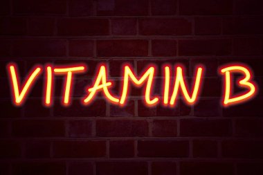 B vitamini neon tabela tuğla üzerinde arka plan duvar. Floresan Neon tüp tuğla iş kavramı 3d render için oturum