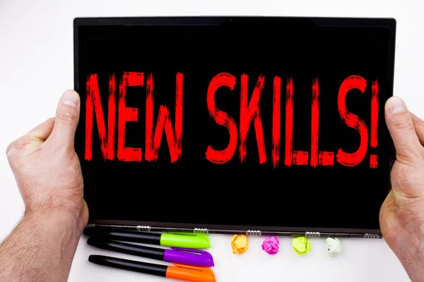 New Skills text written on tablet, computer in the office with marker, pen, stationery. Business concept for Education Knowledge Development white background with copy space