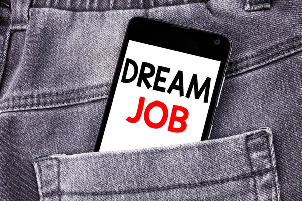 Conceptual hand writing text caption showing Dream Job. Business concept for Dreaming about Employment Job Position written mobile cell phone with copy space in the back pants trousers pocket