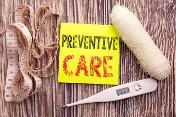 Preventive Care. Business fitness health concept for Health Medicine Care written sticky note empty paper background with copy space bandage and thermometer