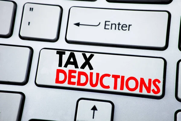Writing text showing Tax Deductions. Business concept for Finance Incoming Tax Money Deduction written on white keyboard key with copy space. Top view. — Stock Photo, Image