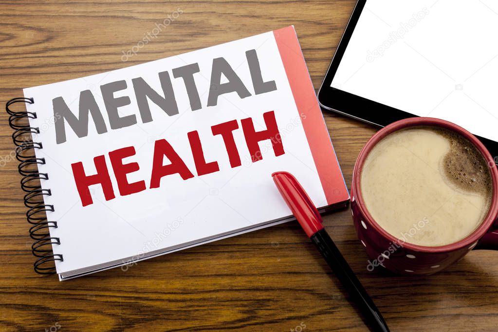 Handwriting Announcement text showing Mental Health. Business concept for Anxiety Illness Disorder Written on notepad note paper on wooden background with space office view with pencil marker