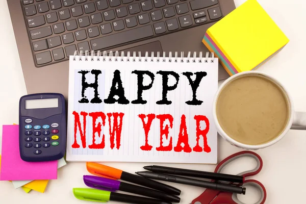 Word writing Happy New Year in the office with surroundings such as laptop, marker, pen, stationery, coffee. Business concept for Christmas Celebration Workshop white background with copy space