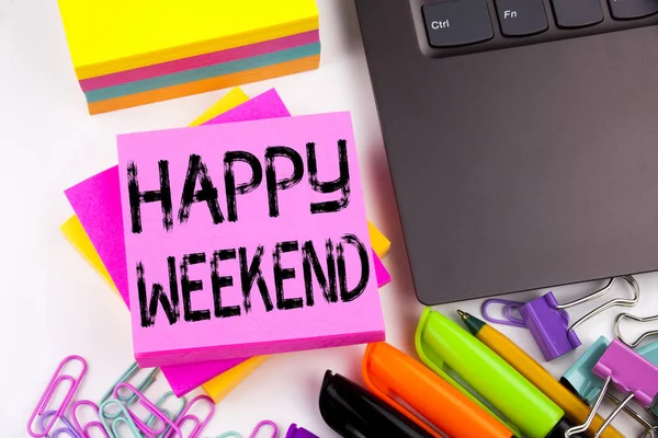 Writing text showing Happy Weekend made in the office with surroundings such as laptop, marker, pen. Business concept for Holiday Day Off Celebration Workshop white background with copy space