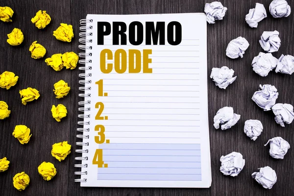 Концептуальная рукописная надпись с надписью Promo Code. Business concept for Promotion for Online Business Written on Notepad note notebook wooden background with sticky folded yellow and white — стоковое фото