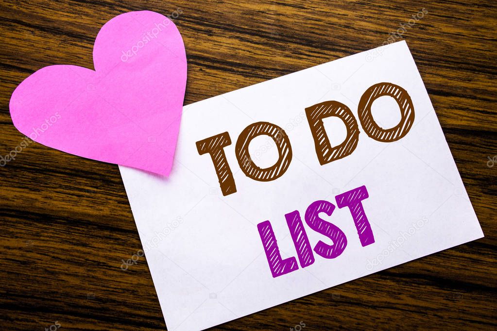 Conceptual hand writing text showing To Do List. Concept for Plan Lists Remider written on sticky note paper, wooden wood background. With pink heart meaning love adoration.