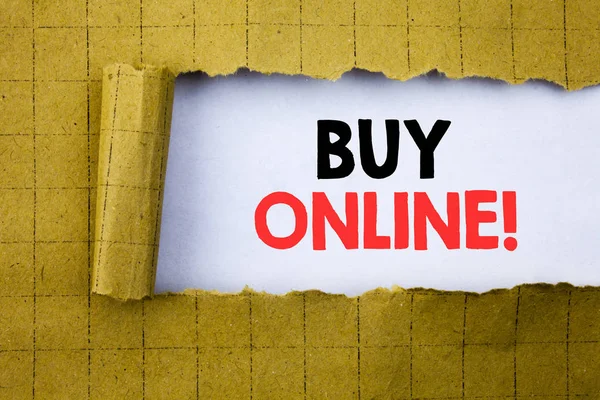 Compre online. Conceito de negócio para e-commerce Compra escrita em papel branco sobre o papel amarelo dobrado . — Fotografia de Stock