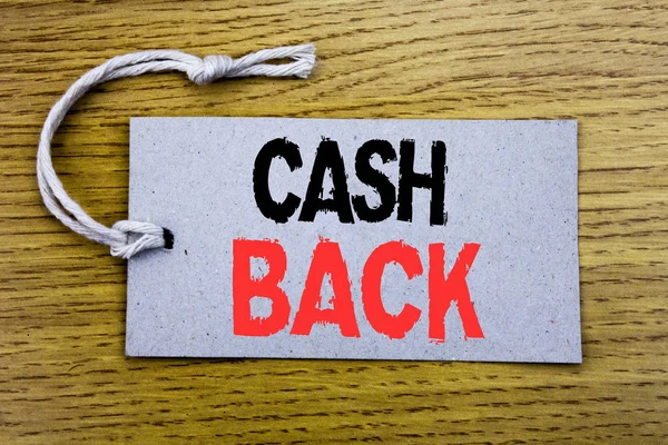 Konceptuella hand skriva textfält som visar kontanter tillbaka Cashback. Affärsidé för pengar Assurance skriven på prislappen papper med kopia utrymme på trä vintage bakgrunden — Stockfoto
