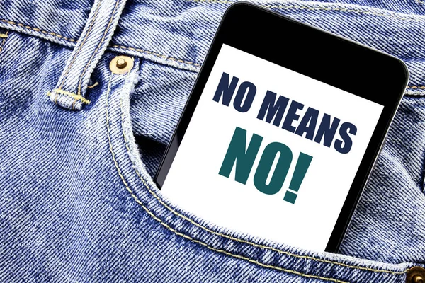 Conceptual hand writing text caption inspiration showing No Means No. Business concept for Stop Anti Rape Slogan Written phone mobile phone, cellphone placed in the man front jeans pocket.