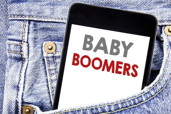 Writing text showing Baby Boomers. Business concept for Demographic Generation written on cellphone phone smartphone in the men pocket.