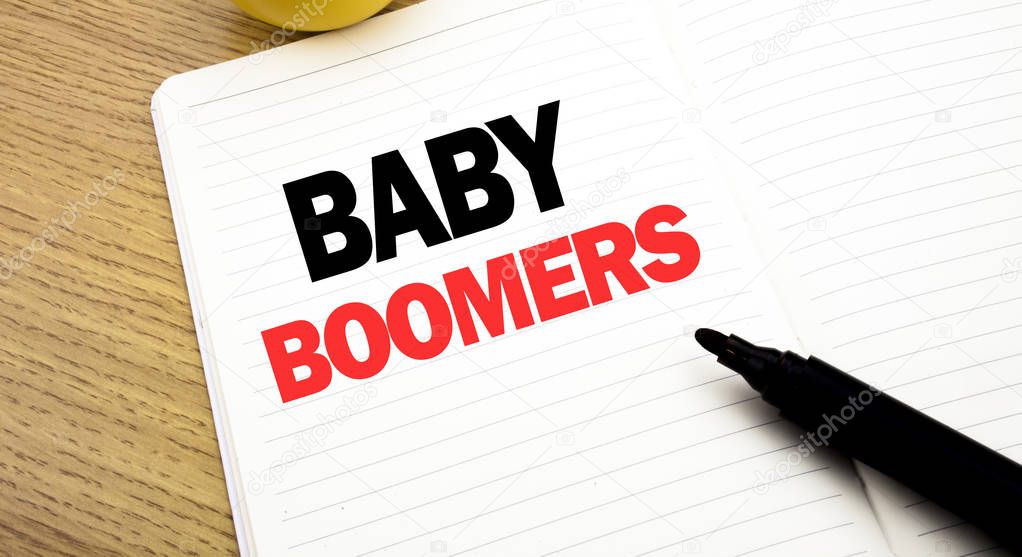 Conceptual hand writing text caption inspiration showing Baby Boomers. Business concept for Demographic Generation written on notebook, copy space on book background with marker pen