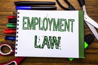 Conceptual hand writing text Employment Law.  Concept for Employee Legal Justice Written on notebook, wooden background with office equipment like pens scissors colourful marker   clipart