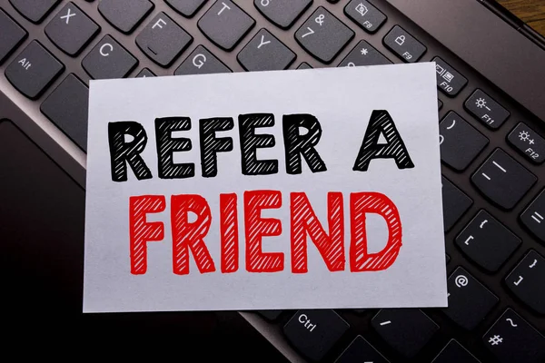 Word, writing Refer A Friend. Business concept for Referral Marketing written on sticky note paper on the dark keyboard background. — Stock Photo, Image