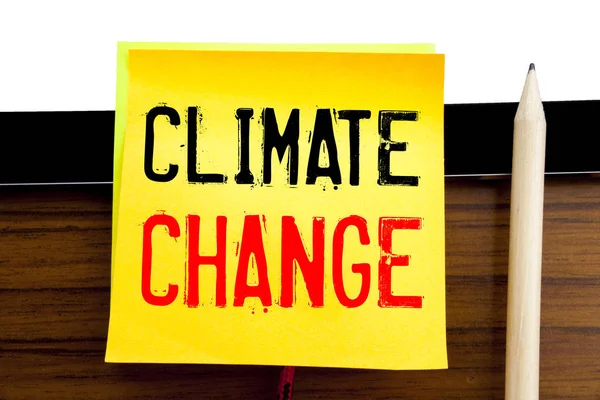 Hand writing text caption inspiration   Climate Change. Business concept for Global Planet Warming written on sticky note paper on the wooden and tablet background. — Stock Photo, Image