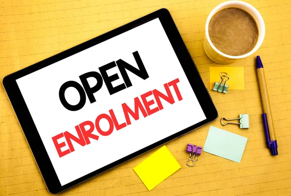 Conceptual hand writing text caption showing Open Enrolment. Business concept for Medicine Doctor Enroll Written on tablet laptop, wooden background with sticky note, coffee and pen — Stock Photo, Image