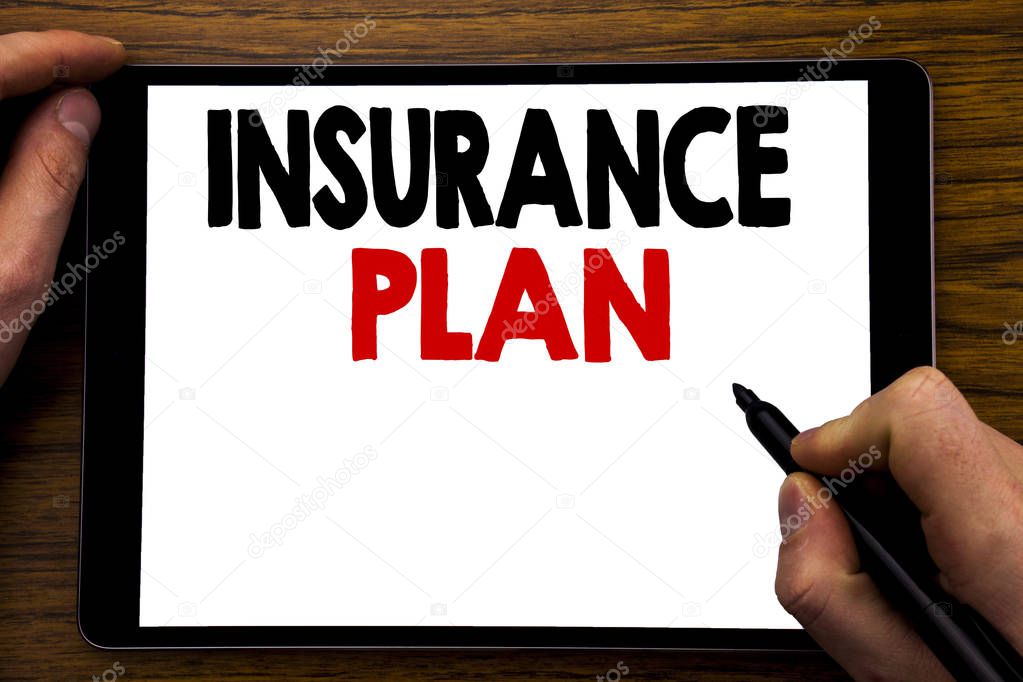 Handwriting Announcement text showing Insurance Plan. Business concept for Health Life Insured Written on tablet laptop, wooden background with businessman hand, finger writing on PC.
