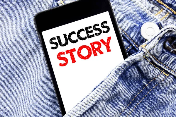 Hand writing text caption inspiration showing Success Story. Business concept for Inspiration Motivation Written phone mobile phone, cellphone placed in the man front jeans pocket. — Stock Photo, Image