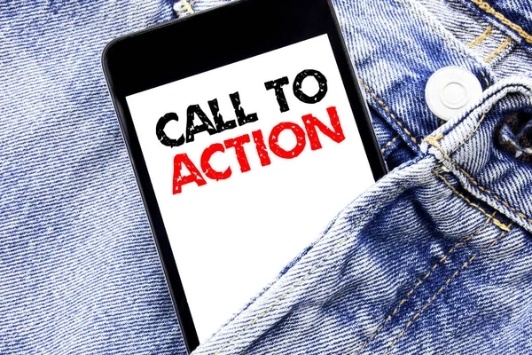 Hand writing text caption inspiration showing Call To Action. Business concept for Proactive Success Goal Written phone mobile phone, cellphone placed in the man front jeans pocket.