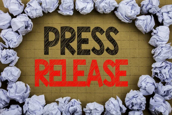 Press Release. Business concept for Statement Announcement Message written on vintage background with copy space on old background with folded paper balls