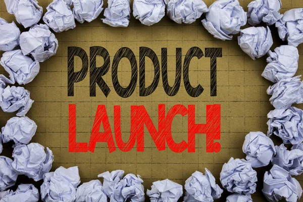 Product Launch. Business concept for New Products Start written on vintage background with copy space on old background with folded paper balls