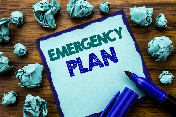 Writing text showing Emergency Plan. Business concept for Disaster Protection Written on sticky note paper, wooden background with marker folded yellow paper meaning thinking — Stock Photo, Image