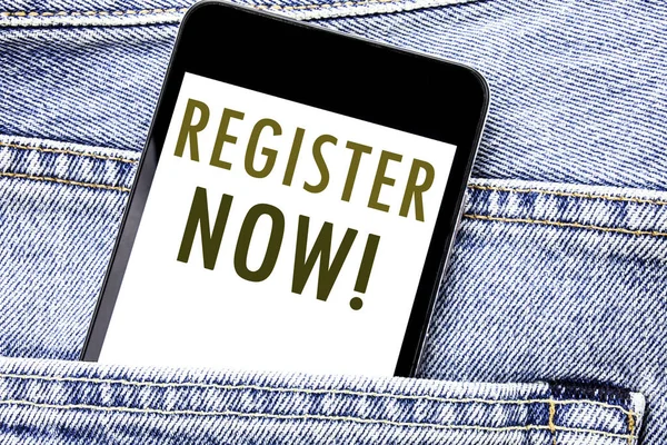 Handwriting Announcement text showing Register Now. Business concept for Join for Membership Written phone mobile phone, cellphone placed in the man front jeans pocket. — Stock Photo, Image