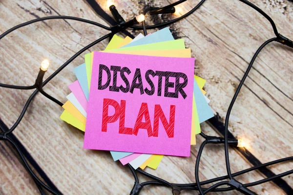 Handwriting Announcement text showing Disaster Plan. Business concept for Emergency Recovery written on sticky note with copy space on the wooden vintage background — Stock Photo, Image