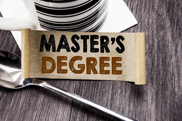 Handwriting Announcement text showing Master s Degree. Business concept for Academic Education written on sticky note paper on the wooden wood background. With marker and coffee. Office top view. — Stock Photo, Image