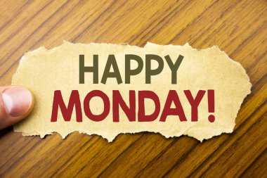 Mutlu Pazartesi gösterilen metin yazma. Yeni hafta ahşap arka plan insan parmağı ile bir not kağıdına yazılı motivasyon için iş kavramı. Vintage tarzı.