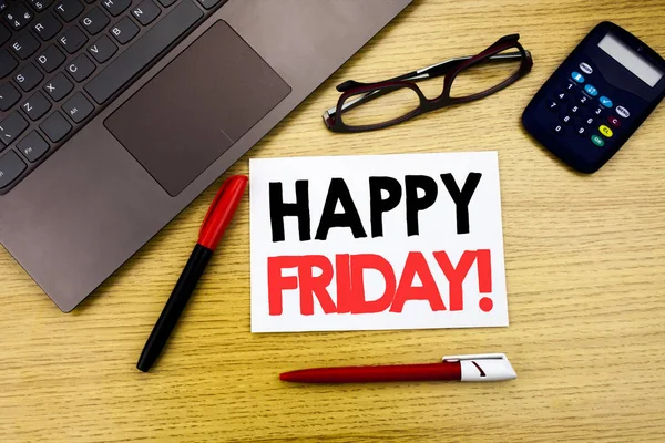 Handwritten text caption showing Happy Friday . Business concept writing for Weekend Welcoming written on paper, wooden background in office with space, marker pen and glasses — Stock Photo, Image