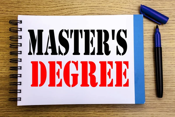 Handwriting Announcement text showing Master s Degree. Business concept for Academic Education Written on notepad note paper background with space office view with pencil marker