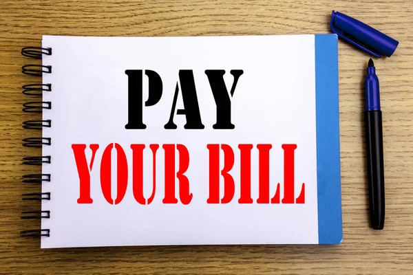 Handwriting Announcement text showing Pay Your Bill. Business concept for Payment for Goverment Written on notepad note paper background with space office view with pencil marker — Stock Photo, Image