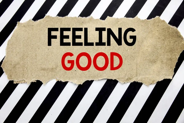 Handwritten text showing Feeling Good. Business concept writing for Happy Positive Attitude Written on note paper, black background with space.