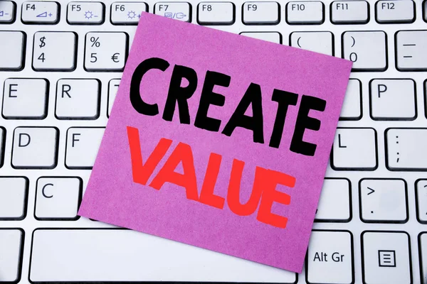 Handwriting Announcement text showing Create Value. Business concept for Creating Motivation written on sticky note paper on the white keyboard background.