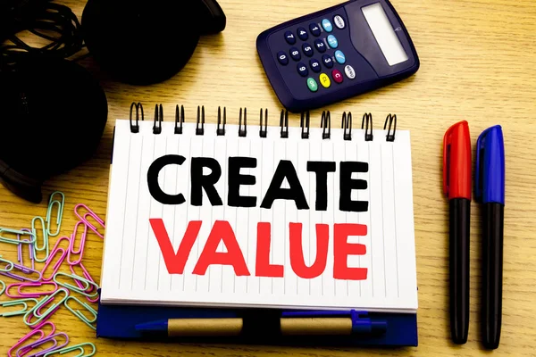 Conceptual hand writing text caption showing Create Value. Business concept for Creating Motivation written on notebook book on the wooden background in Office with laptop coffee