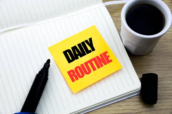Hand writing text caption inspiration showing Daily Routine. Business concept for Habitual Lifestyle written on sticky note paper, Wooden background with space, Coffee and marker — Stock Photo, Image