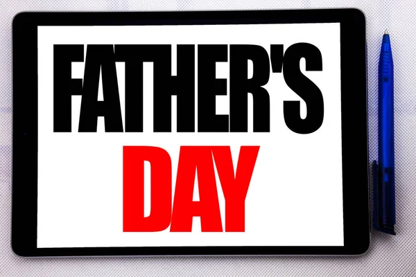 Conceptual hand writing text caption inspiration showing Father s Day. Business concept for Dad Celebration Event written on tablet computer on the white background with pen in the office. — Stock Photo, Image